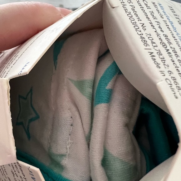 Miracle blanket swaddle NWT.  Newborn - 14 weeks. Aqua stars pattern. - Picture 4 of 5